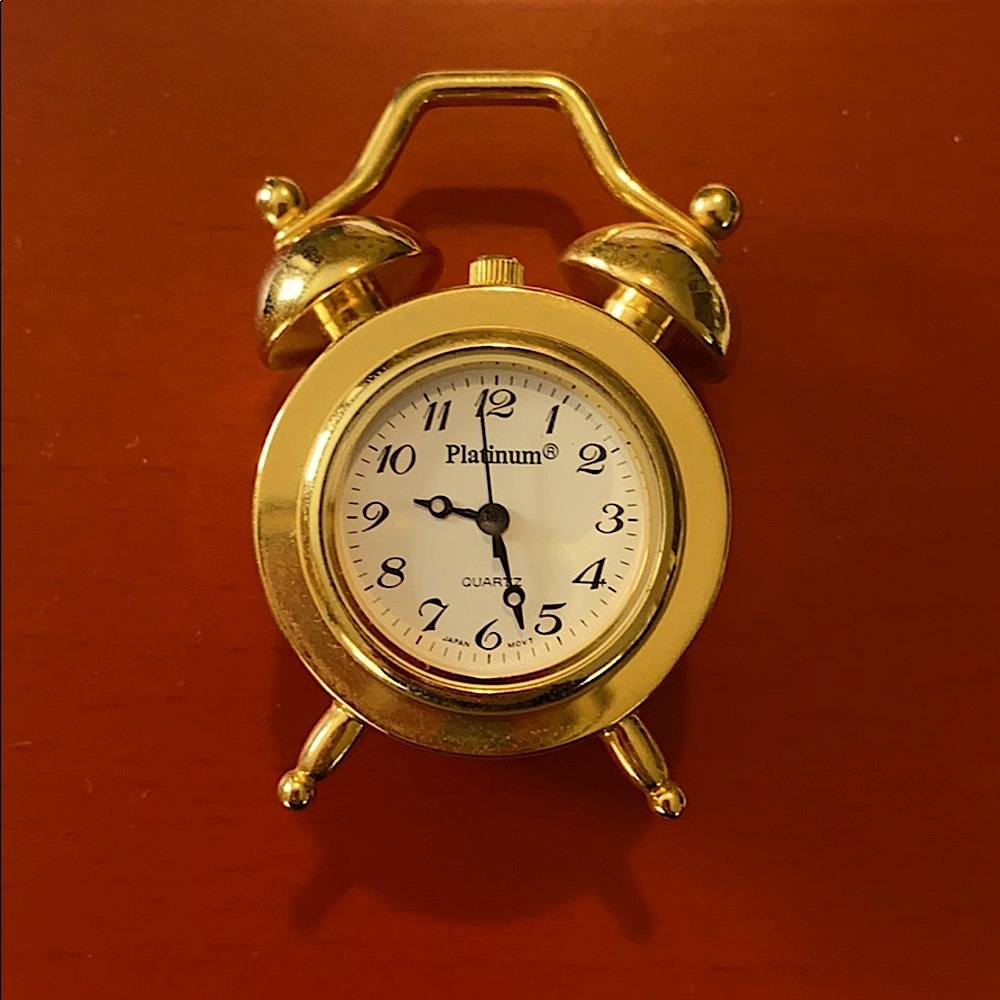 Platinum, gold plated solid brass, mini clock